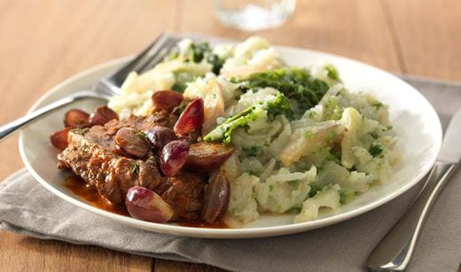 recipe image Aardperenstamppot met groene kool, runderlapjes en druiven