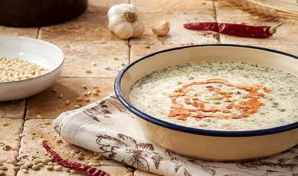 recipe image Yoğurtlu Buğdaylı Yeşil Mercimek Çorbası